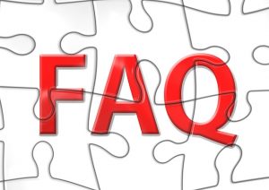 Word "FAQ" over a puzzle