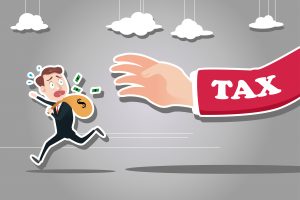 Clip art of a man with a money bag running from a big arm labeled "tax" 