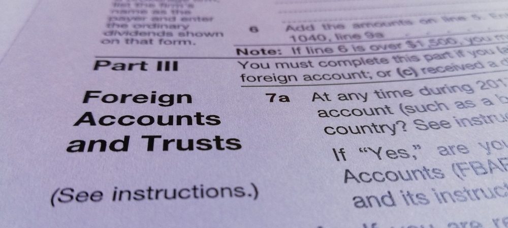 Close up of an IRS tax document entitled "Foreign Accounts and Trusts"